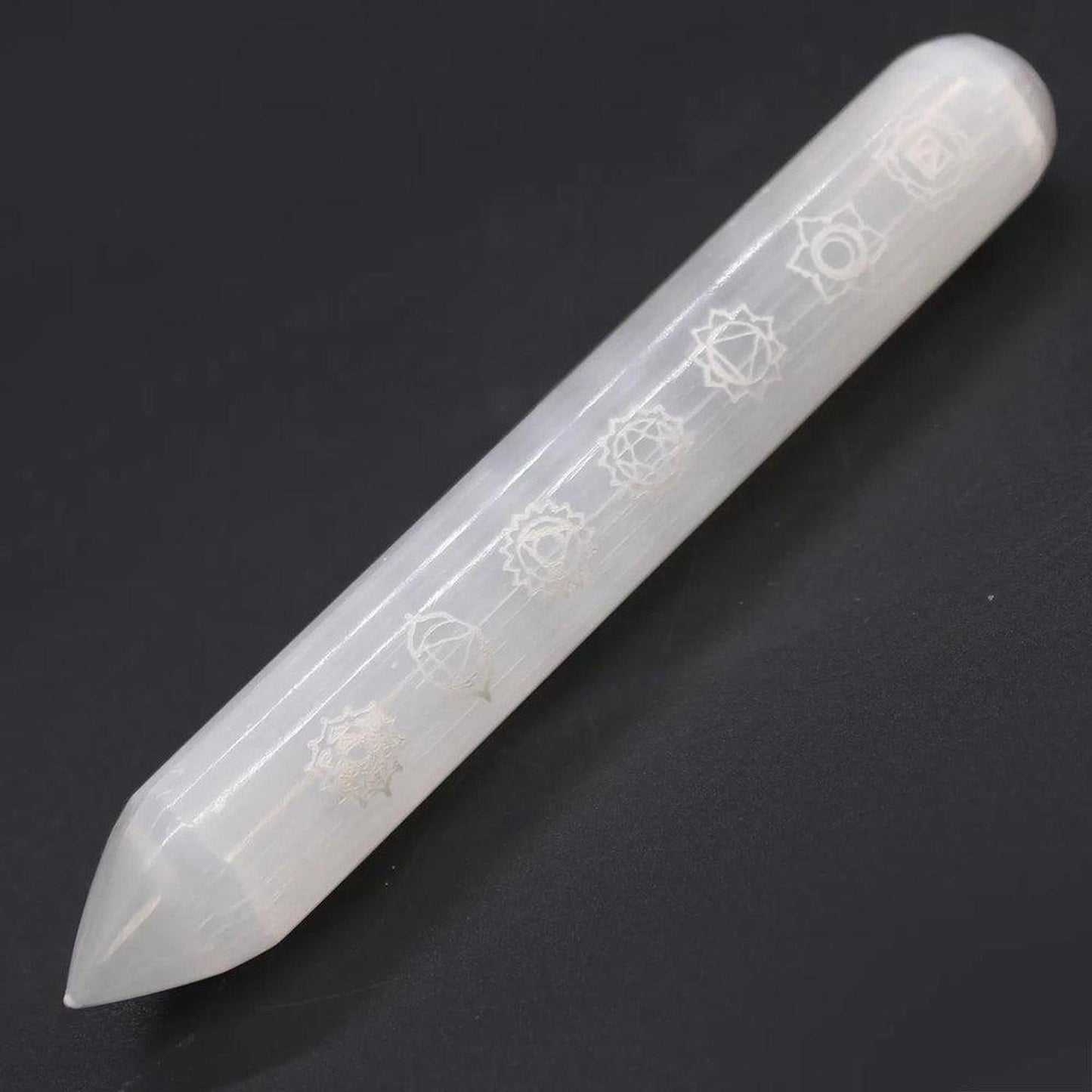 Selenite 7 Chakra Engraved Wand - Energy Cleanser & Crystal Amplifier - Selenite wand engraved with 7 Chakras. Powerful energy cleanser, aura tool, and crystal amplifier. Promotes peace, clarity, and high-vibe energy flow. Buy Now at Sacred Remedy