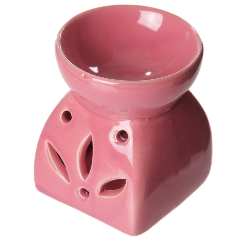 Buy Modern Cermaic Oil Burner. Wax Melts, Essential Oils, Water. - This ceramic oil burner features a cut-out leaf design that allows a vivid, beautiful flame to dance through the openings as it warms your space. Use it with at Sacred Remedy Online