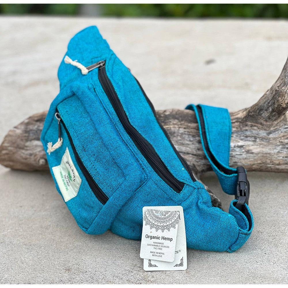 Buy Eco-Friendly Boho Hippie Style Hemp Fanny Pack Hip Waist Bag: Turquoise Blue - Made in Nepal from high-quality, sustainable hemp fabric, our fanny packs are not only durable but also environmentally friendly. Perfect for all your essentials – phone, wallet, keys, passport, etc. Great gift for your loved ones who enjoy activities like travelling, walking, running, hiking, biking, camping etc. at Sacred Remedy Online