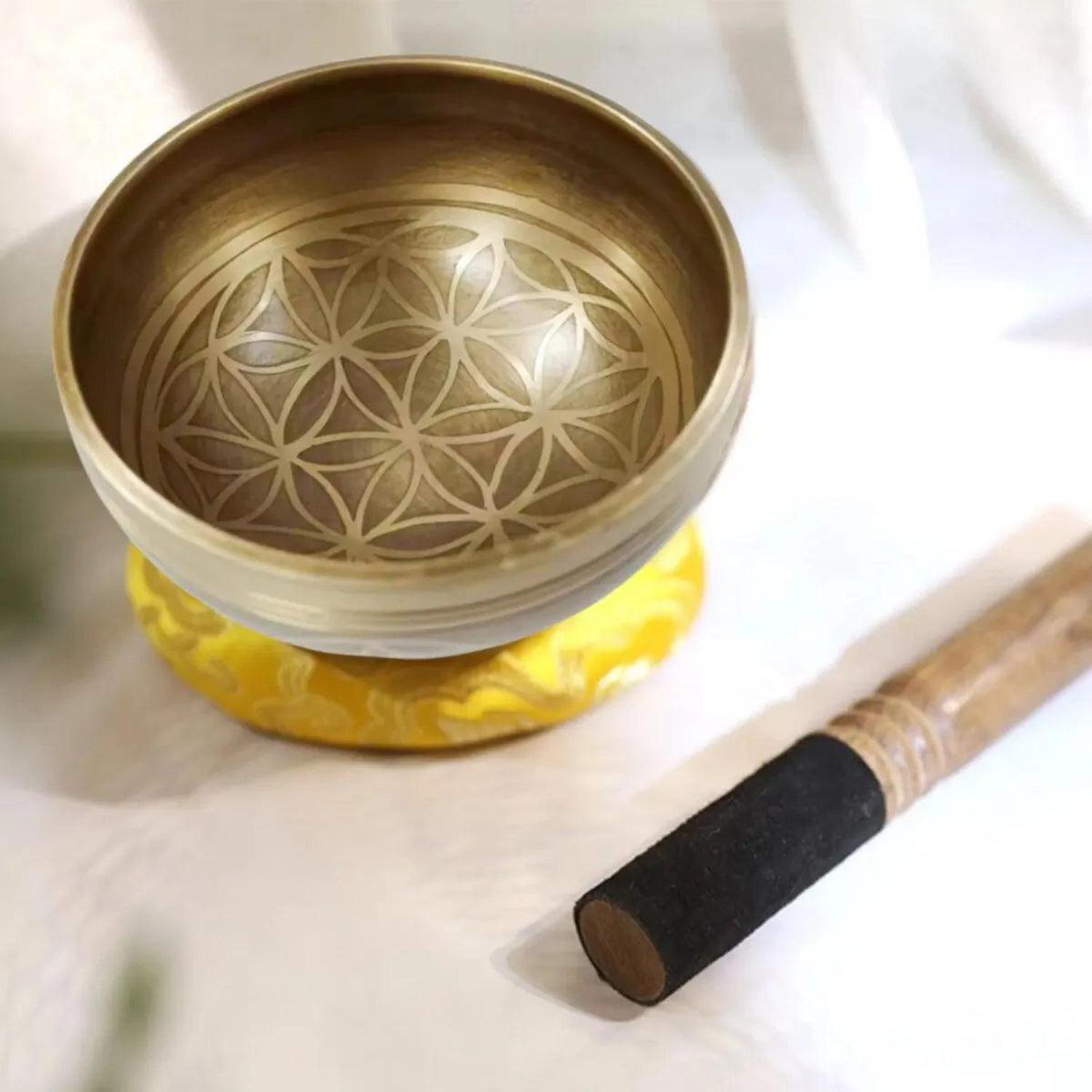 Tibetan Singing Bowl Set | Meditation & Sound Healing - Shop this hand-hammered Tibetan Singing Bowl Set. Features the Flower of Life symbol for meditation. Perfect for stress reduction, sound healing, and yoga. Buy Now at Sacred Remedy