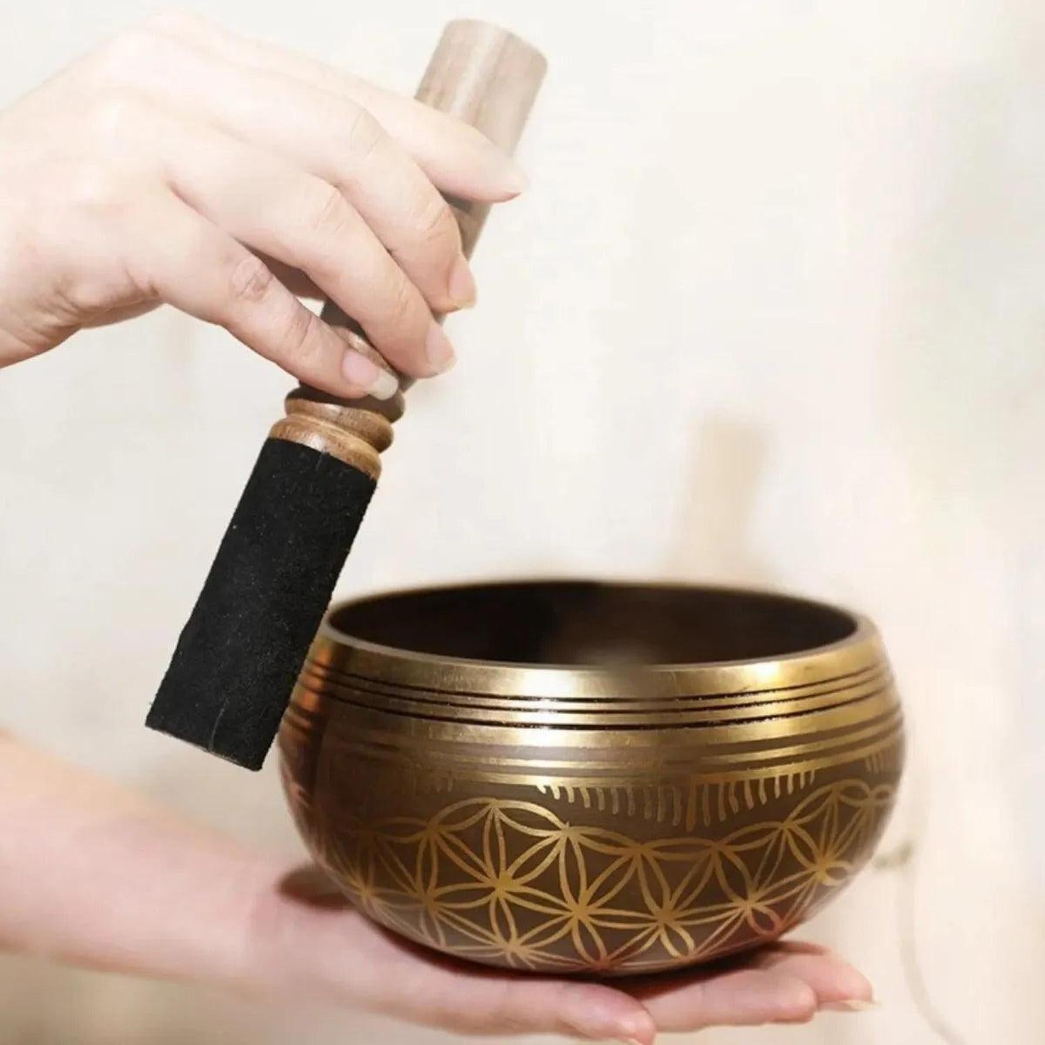 Tibetan Singing Bowl Set | Meditation & Sound Healing - Shop this hand-hammered Tibetan Singing Bowl Set. Features the Flower of Life symbol for meditation. Perfect for stress reduction, sound healing, and yoga. Buy Now at Sacred Remedy