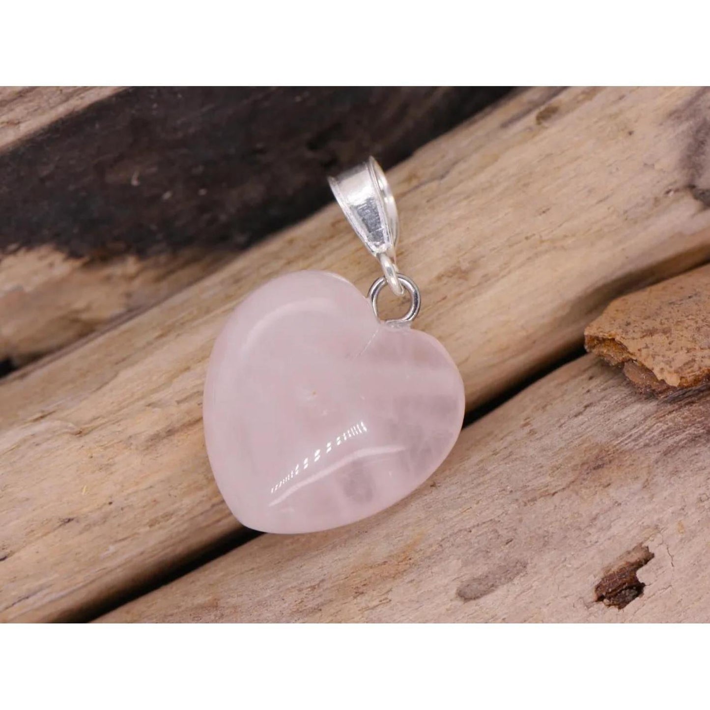 Heart Shape Rose Quartz Pendant Special Gift Healing Stone - Embrace the power of love and tranquility with a stunning Heart Shape Rose Quartz Pendant! This captivating necklace isn't just beautiful - it's believed to hold a wealth of emotional benefits! Buy Now at Sacred Remedy