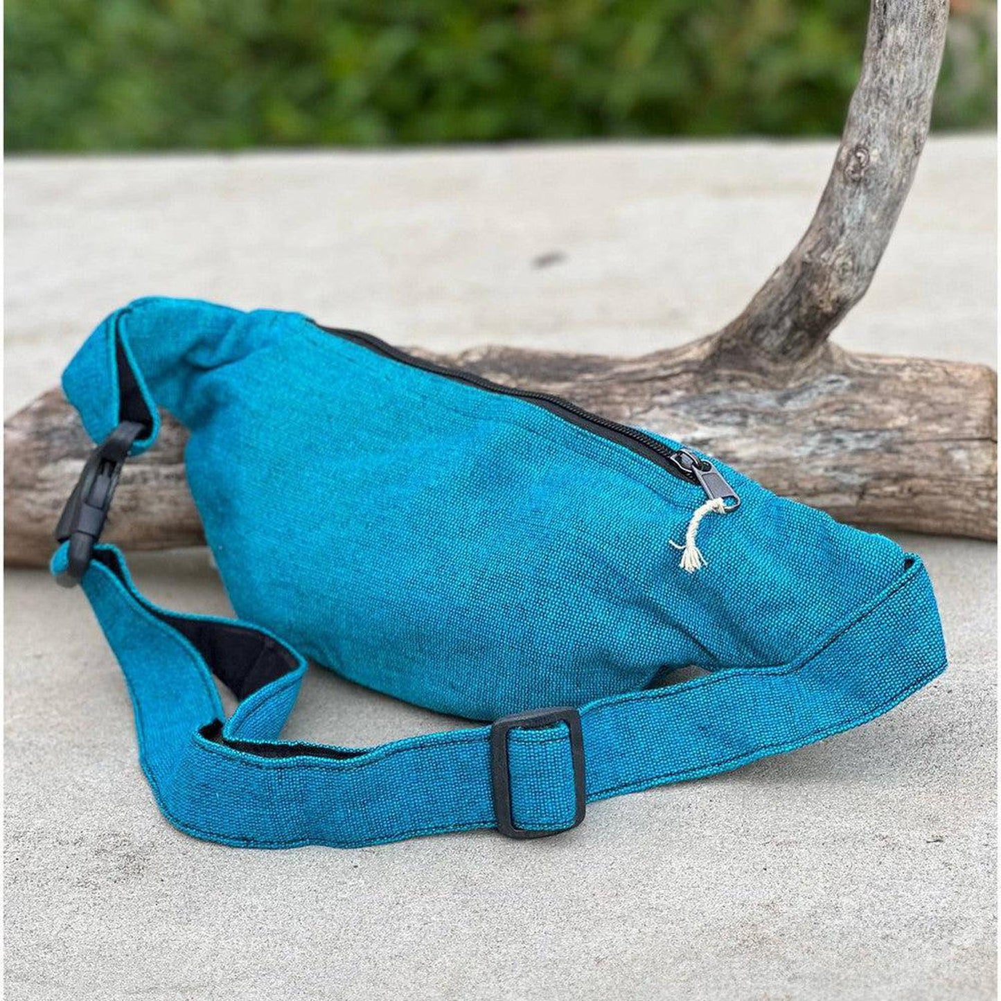 Eco-Friendly Boho Hippie Style Hemp Fanny Pack Hip Waist Bag: Turquoise Blue - Made in Nepal from high-quality, sustainable hemp fabric, our fanny packs are not only durable but also environmentally friendly. Perfect for all your essentials – phone, wallet, keys, passport, etc. Great gift for your loved ones who enjoy activities like travelling, walking, running, hiking, biking, camping etc. Buy Now at Sacred Remedy