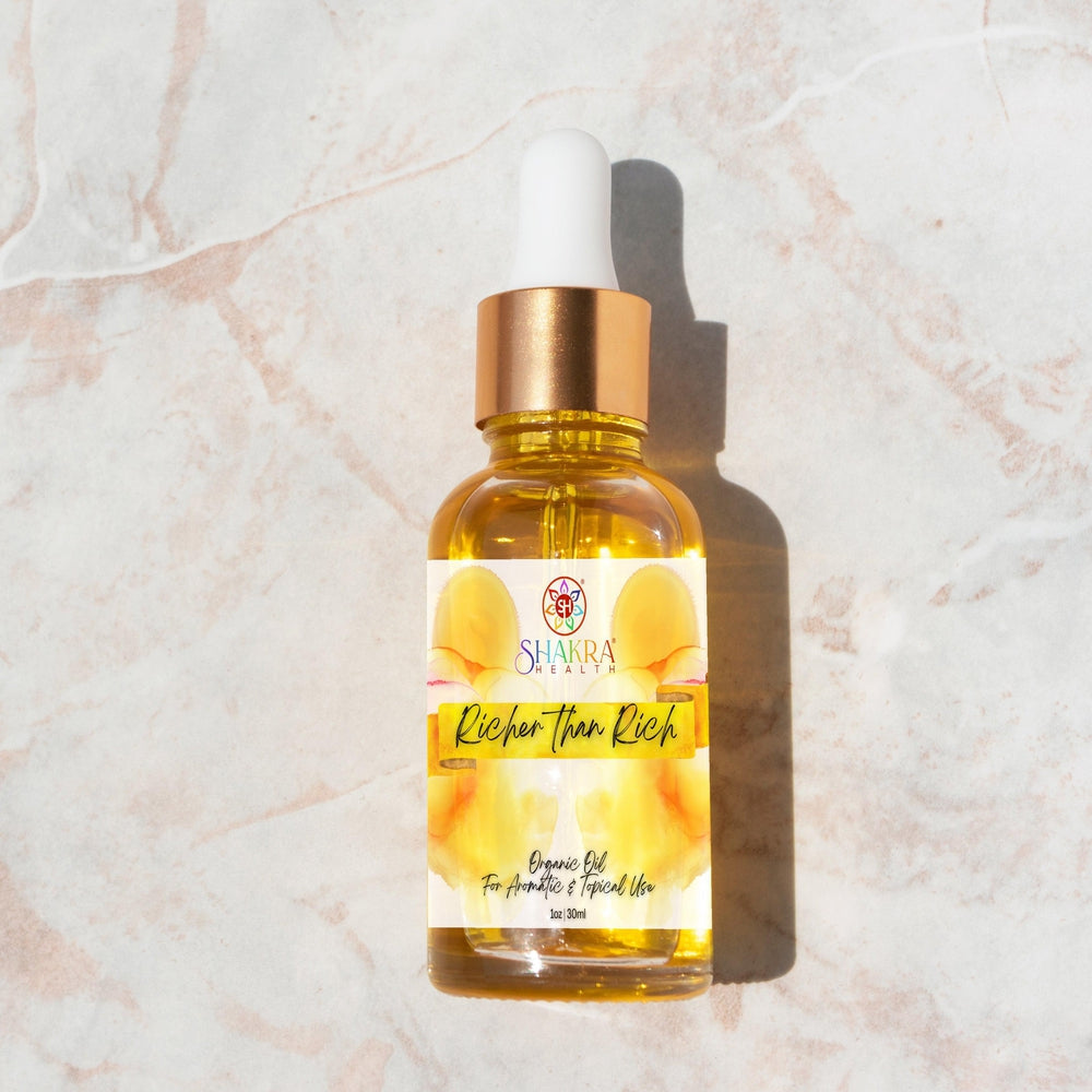 Buy Richer Than Rich Ritual Oil | Vegan, Organic Wealth Manifestation - Harness the power of intention and nature's bounty with Richer Than Rich Ritual Oil!
 This vegan and organic oil blend is specially formulated to support your wealth manifestation journey. at Sacred Remedy Online