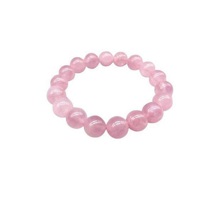 Natural Rose Quartz Bracelet | Stone of Love & Emotional Healing - Shop the Rose Quartz Bracelet with 10mm beads. The Stone of Love promotes self-love, healing, inner peace, and attracts positive relationships. Ideal crystal jewellery. Buy Now at Sacred Remedy