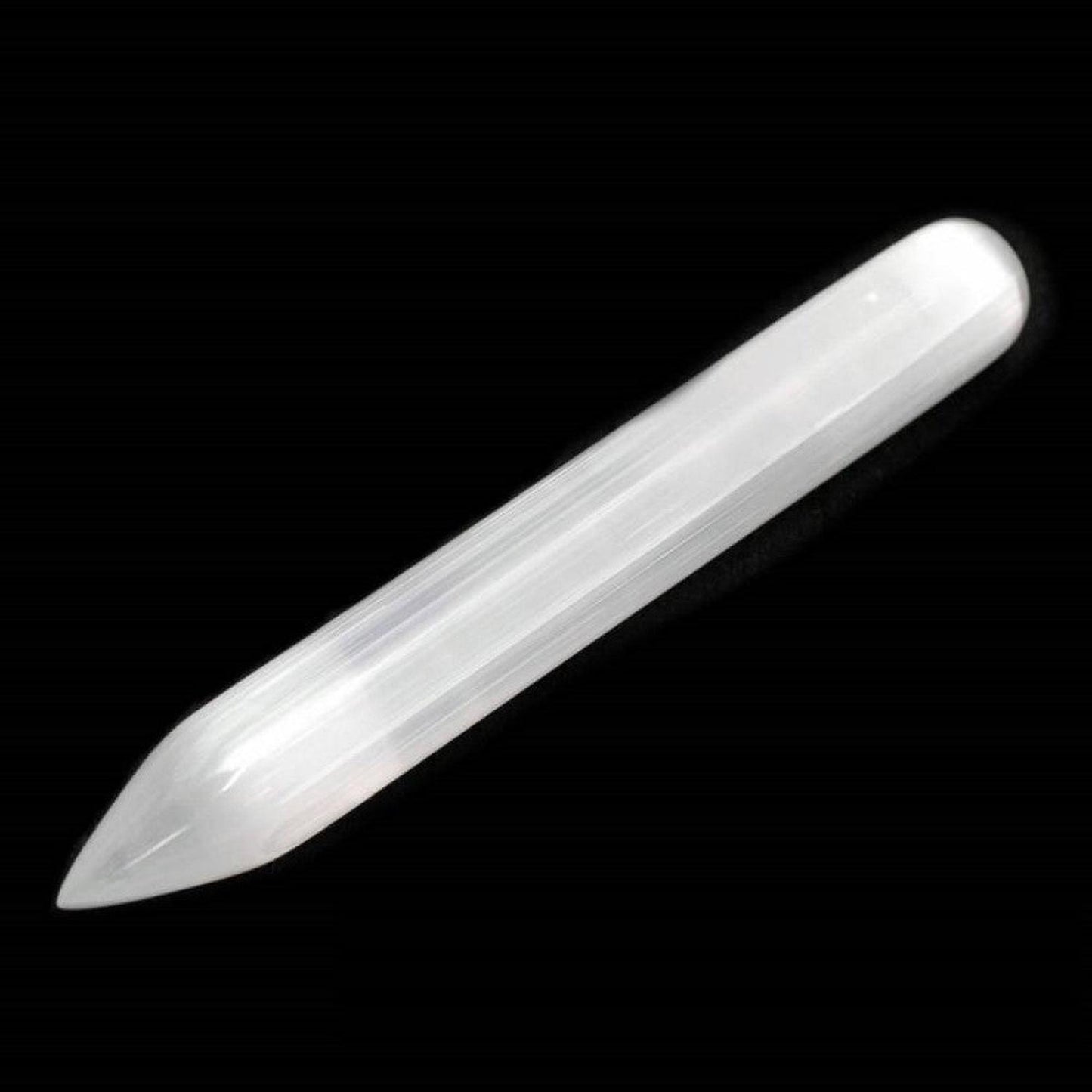 Selenite Smooth Pencil Wand | Energy Clearing & Spiritual Practise - Selenite has a gentle and fine vibration is often associated with opening up the crown chakra and also accessing angelic consciousness. Some people use selenite as a tool when accessing past life material or for use when meditating. Selenite Smooth Point Massage Wand ideal for combing the aura. Buy Now at Sacred Remedy