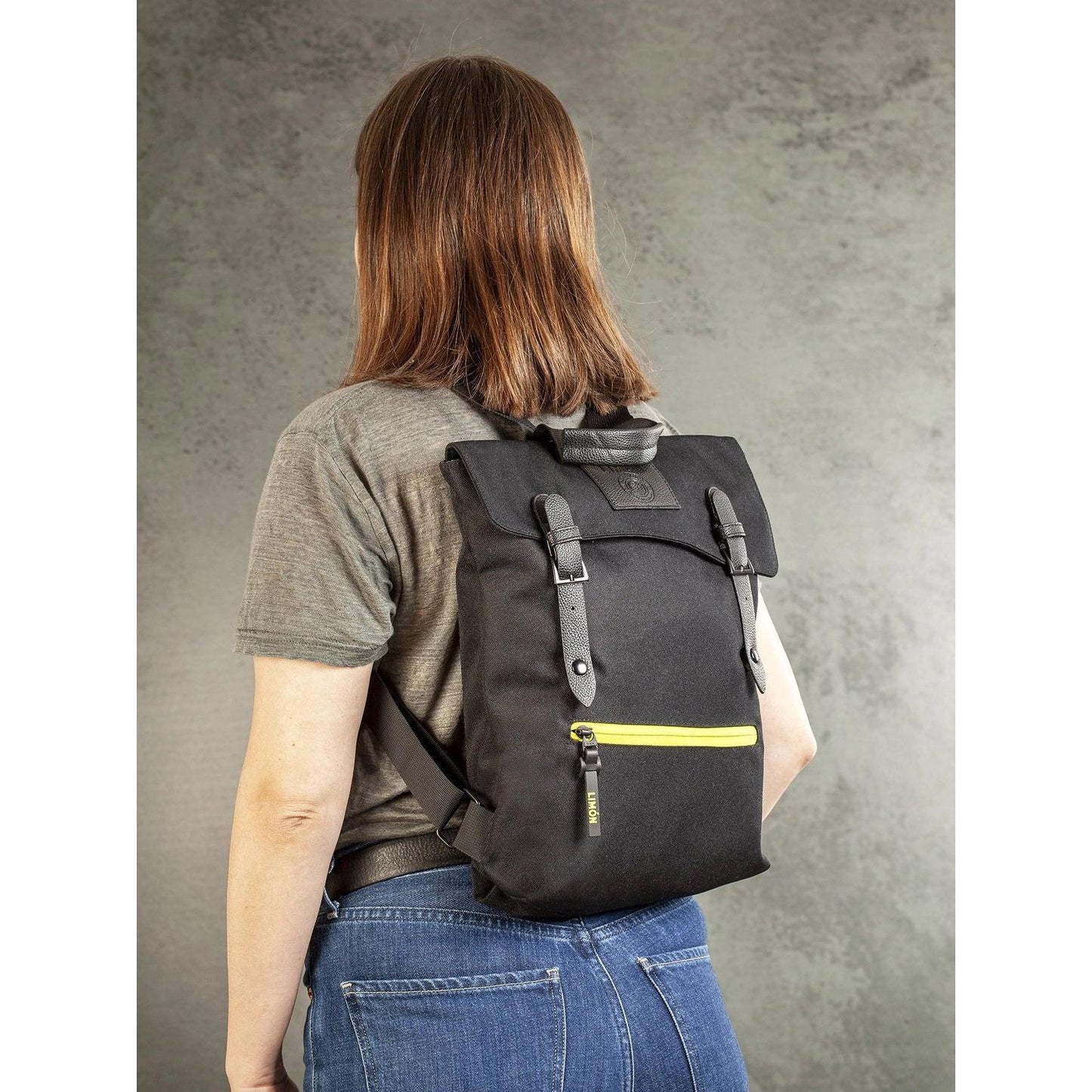 Buy Black Everyday Backpack 9.5L | Ideal for the City Commute - This Vegan-friendly backpack is perfect for everyday use. Made from 69% recycled PET bottles, it has a spacious 9.5L capacity that can hold all your essentials for work or school. With dimensions of 35cm x 8cm x 33cm, it maintains a compact silhouette without compromising on storage. at Sacred Remedy Online