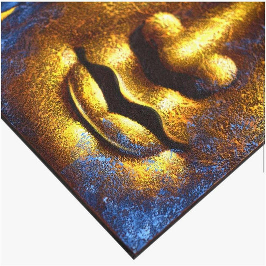 Handcrafted canvas painting featuring a textured golden Buddha face against a deep blue background.