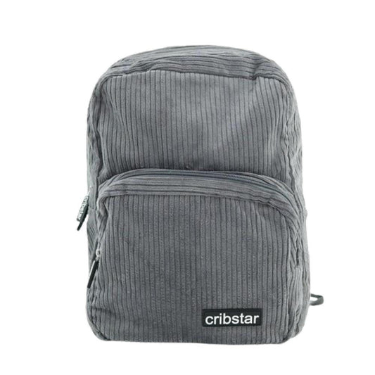 Compact grey corduroy backpack with a front zippered pocket and a black Cribstar logo patch on a white background.