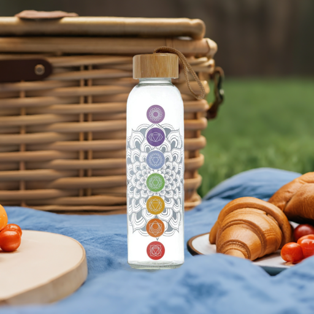 Buy Balance Your Chakras: 500ml BPA Free Glass Water Bottle - 500ml Reusable Glass Water Bottle with 7 Chakra Symbols and Bamboo Lid. Stay hydrated in style with this eco-friendly and empowering water bottle. Enjoy the purity of glass, the beauty of chakra symbols, and the sustainability of bamboo. Perfect for yoga, meditation, or everyday use. BPA-free and leak-proof. at Sacred Remedy Online