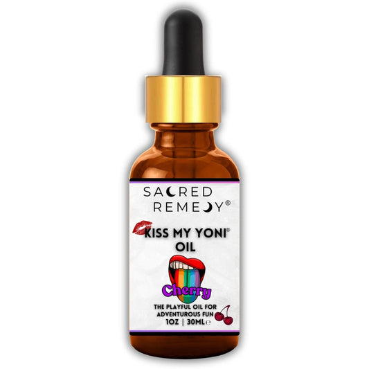 30ml amber glass dropper bottle of Kiss My Yoni Oil with a cherry-themed label and gold cap.