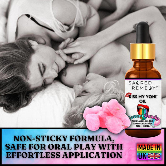 30ml amber glass bottle of Kiss My Yoni Oil in Cotton Candy scent with a dropper, featuring pink cotton candy accents.